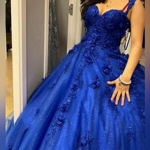 Elegant Blue Gown with Floral Details